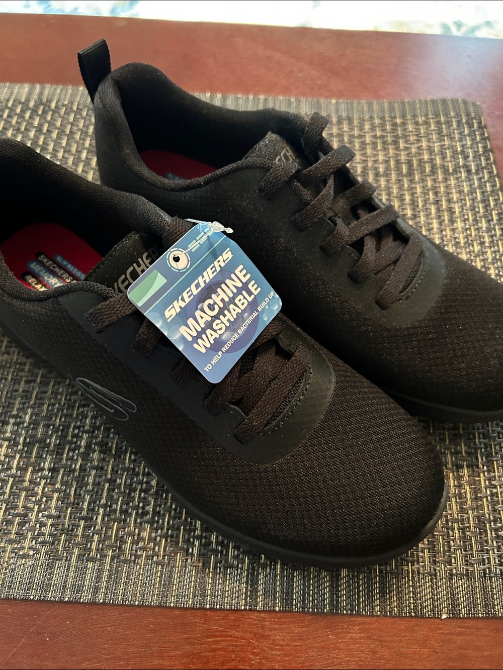 Skechers Women’s  Black Knit Lace-Up Sneakers